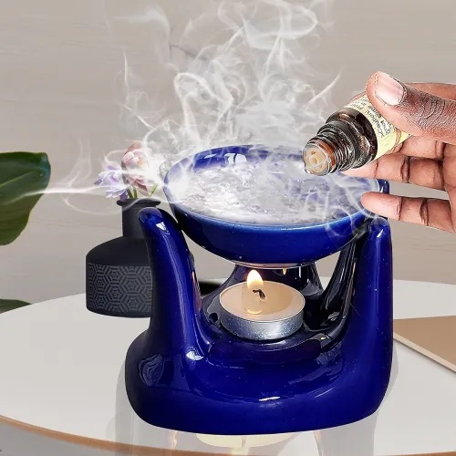 Image of Blue ceramic aroma diffuser with oil