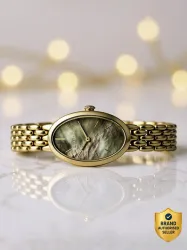 Titan Aura Women Analog Watch Green Dial Gold Strap
