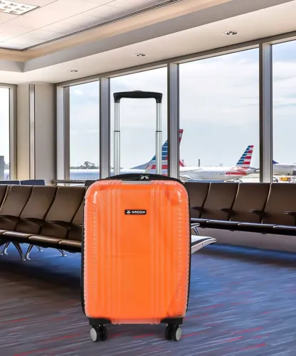 Image of WROGN  Small Cabin Suitcase (55 cm) 8 Wheels - Clearcase - Orange